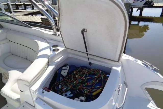 Slide: The Image of Open storage compartment on 2006 Cobalt 282 boat with colorful ropes inside. - 34
