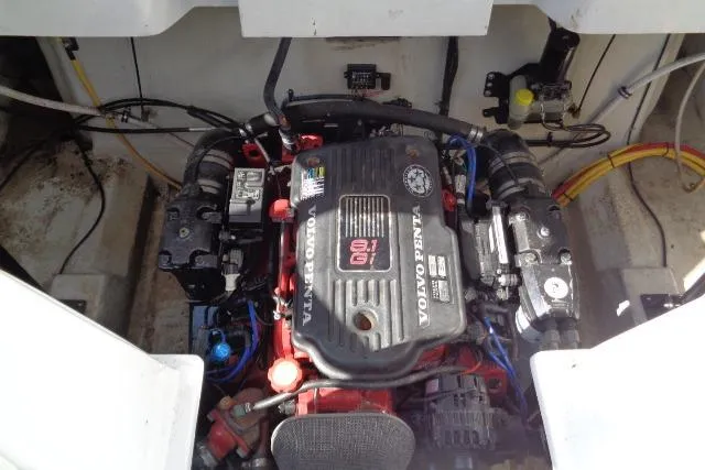 Slide: The Image of Engine compartment of a 2006 Cobalt 282 boat featuring a Volvo Penta engine. - 36