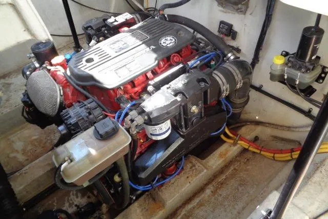 Slide: The Image of Engine compartment of a 2006 Cobalt 282 boat, showcasing detailed mechanical components. - 37