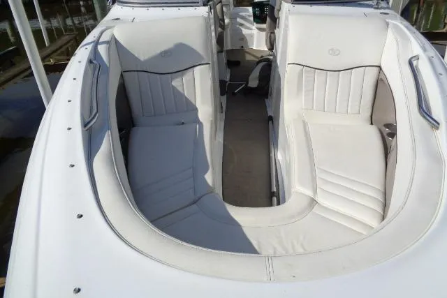 Slide: The Image of 2006 Cobalt 282 boat interior with white leather seating and sleek design. - 6