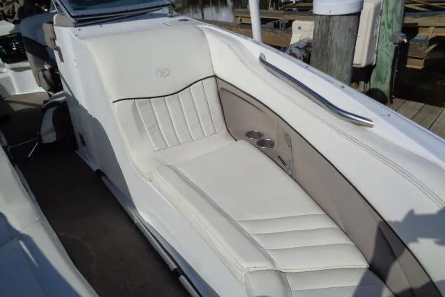 Slide: The Image of 2006 Cobalt 282 boat with white leather seating and stainless steel accents. - 9