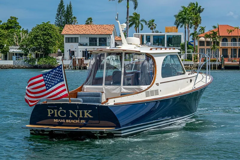 The Image of Hinckley Picnic Boat 37 MKIII, 2011, cruising in Miami Beach waters with American flag. - 0