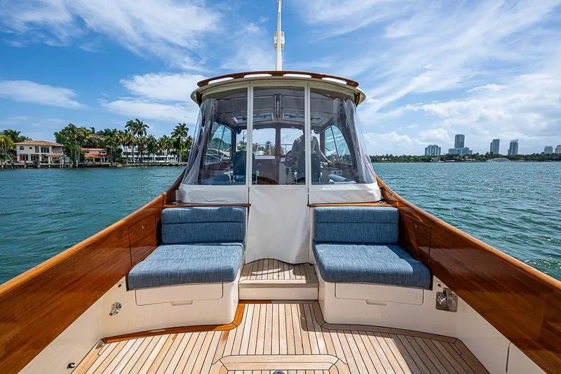 Slide: The Image of Hinckley Picnic Boat 37 MKIII, 2011, cruising on a sunny day with waterfront views. - 6