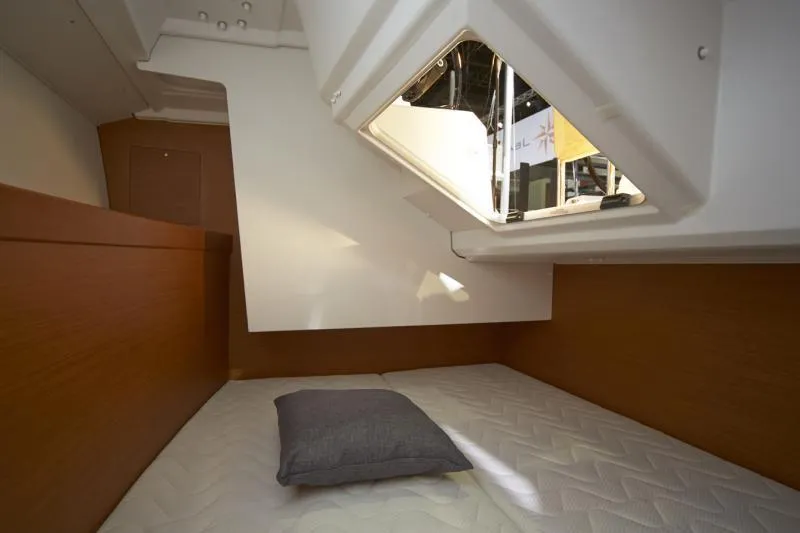 Slide: The Image of Manufacturer Provided Image: 2019 Jeanneau Sun Odyssey 349 cabin interior with bed and window. - 7