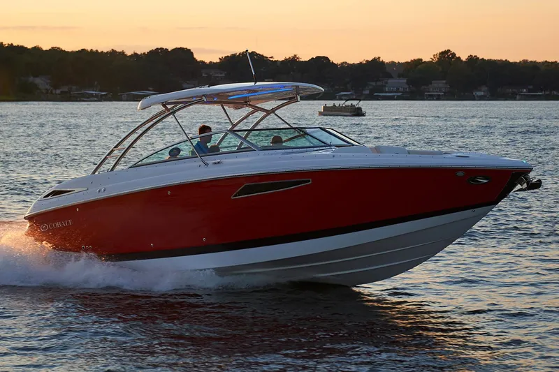The Image of Manufacturer Provided Image: 2017 Cobalt R35 boat cruising on a lake at sunset. - 0