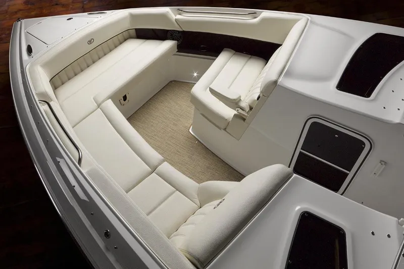 Slide: The Image of Manufacturer Provided Image: 2017 Cobalt R35 boat interior with luxurious white seating and carpeted flooring. - 2