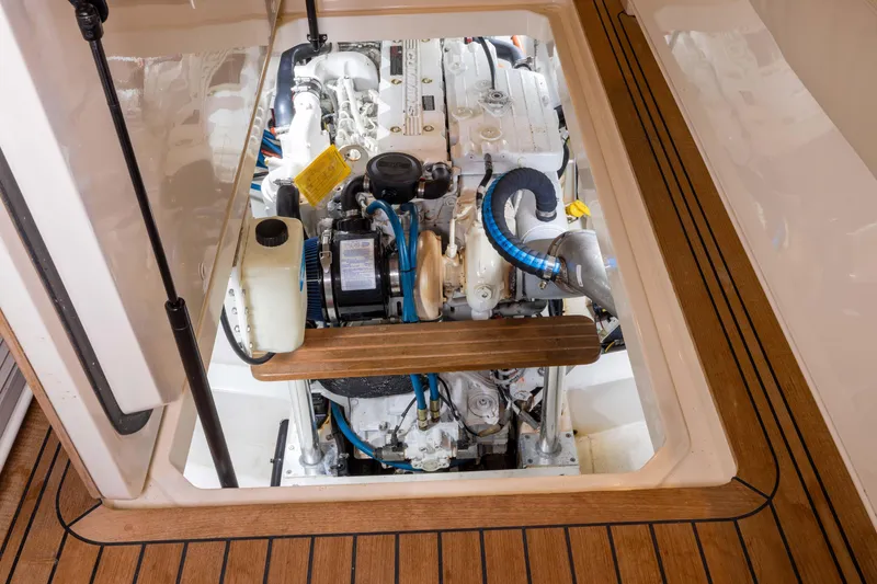 Slide: The Image of Close-up of 2007 Legacy 32 Express boat's polished metal fittings and wooden trim. - 17