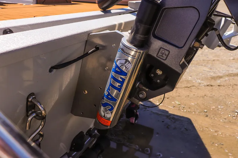 Slide: The Image of Close-up of 2024 Avid 21 FSX boat motor mount with Atlas hydraulic system. - 21
