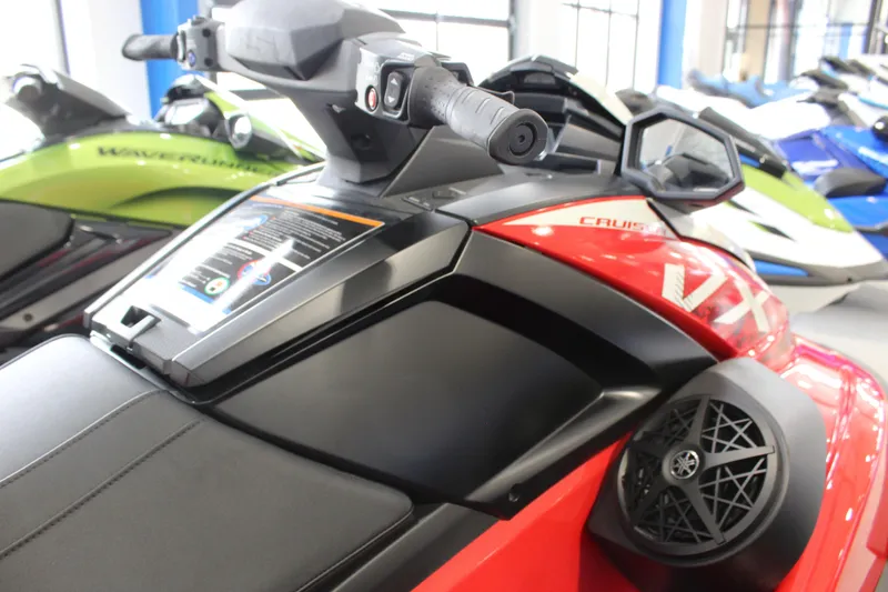 Slide: The Image of 2026 Yamaha WaveRunner VX Cruiser in showroom, featuring sleek design and advanced controls. - 2