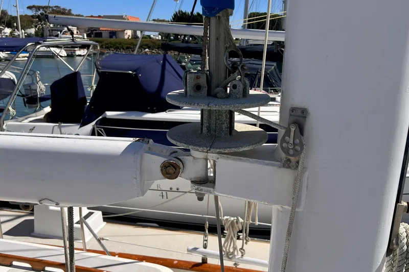 Slide: The Image of Close-up of 1983 Westsail 42 Center Cockpit sailboat rigging and mast details at marina. - 13