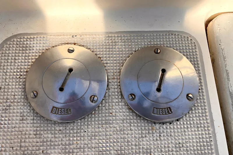 Slide: The Image of Diesel fuel caps on 1983 Westsail 42 Center Cockpit boat deck. - 48