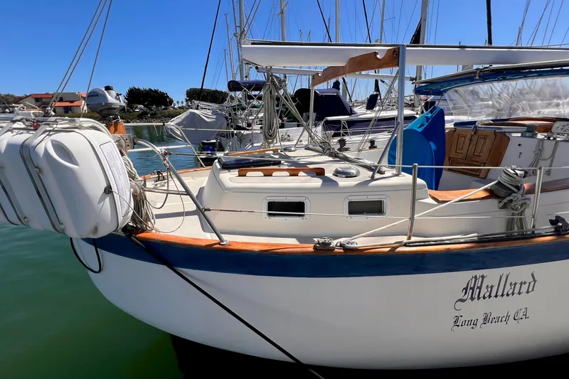 Slide: The Image of 1983 Westsail 42 Center Cockpit sailboat docked, named "Mallard," Long Beach, CA. - 6