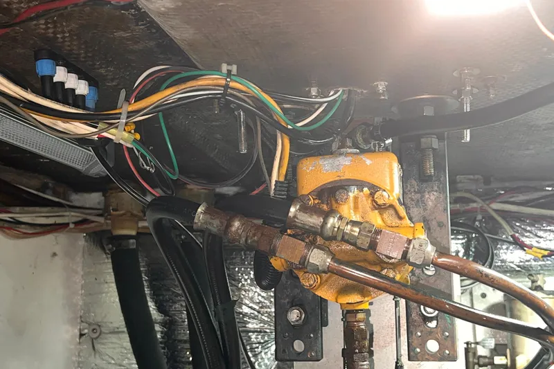 Slide: The Image of Engine compartment wiring and components of a 1983 Westsail 42 Center Cockpit sailboat. - 70