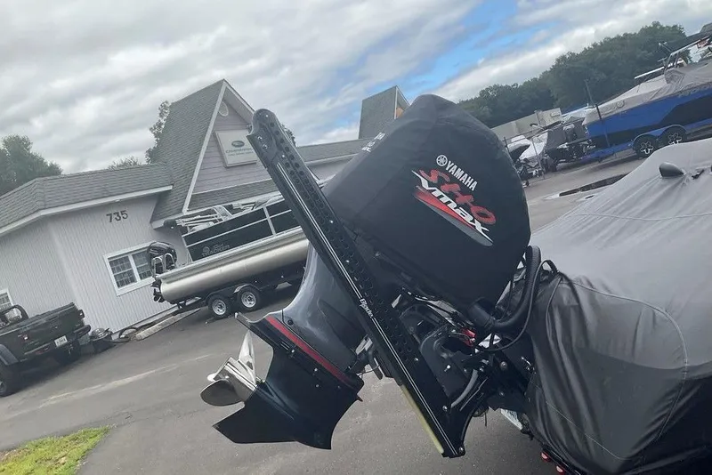Slide: The Image of 2017 Skeeter FX21 LE boat with Yamaha VMAX engine, parked outside a dealership. - 10