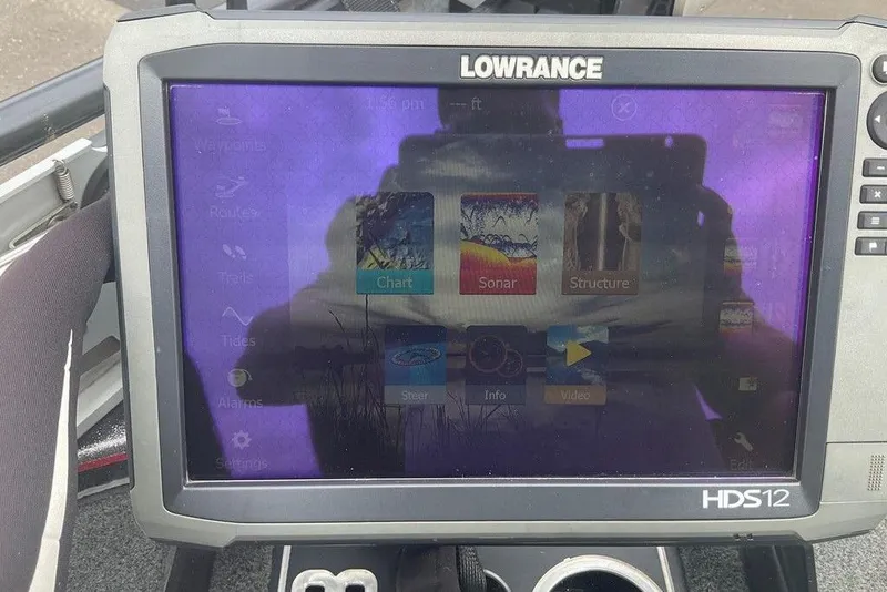 Slide: The Image of Lowrance HDS12 fishfinder on 2017 Skeeter FX21 LE boat, displaying chart, sonar, and structure options. - 16