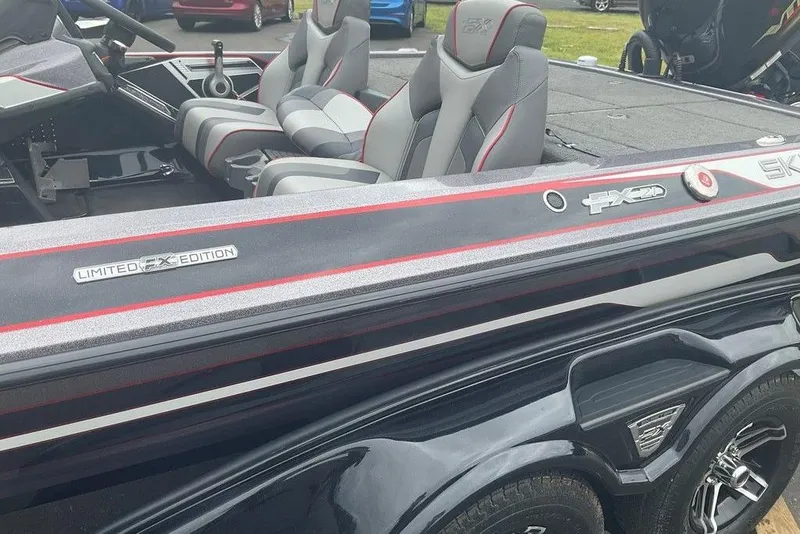 Slide: The Image of 2017 Skeeter FX21 LE boat interior with gray and red seats, Limited Edition model. - 27