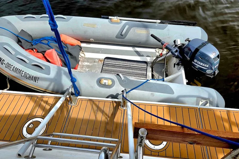 Slide: The Image of Inflatable dinghy with Yamaha motor on Catamaran St. Francis 43, 1995 model. - 16