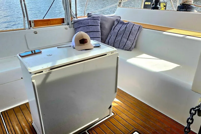 Slide: The Image of Cozy seating area on 1995 Catamaran St. Francis 43 with cushions and a cap. - 20