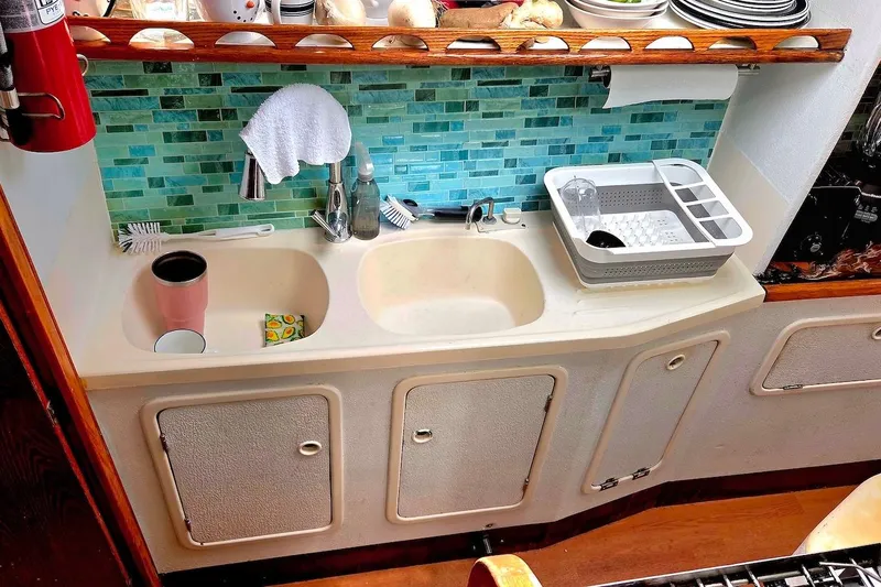 Slide: The Image of Catamaran St. Francis 43 kitchen sink area with turquoise tile backsplash, 1995 model. - 28