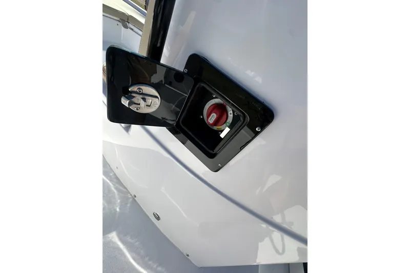 Slide: The Image of Fuel cap compartment on 2026 Action Craft 22 Bay boat. - 25