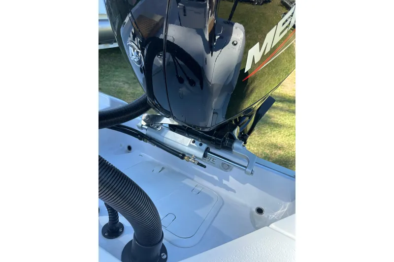 Slide: The Image of 2026 Action Craft 22 Bay boat engine detail with Mercury motor. - 40