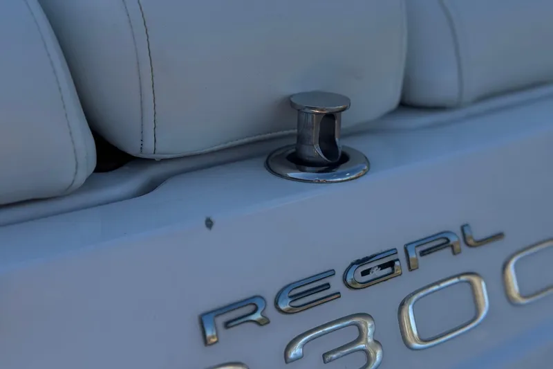 Slide: The Image of Close-up of 2010 Regal 2300 RX Bowrider boat emblem and cleat. - 10