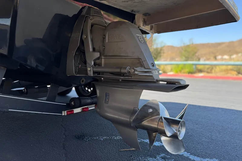 Slide: The Image of Close-up of a 2010 Regal 2300 RX Bowrider's propeller and stern drive on a trailer. - 11