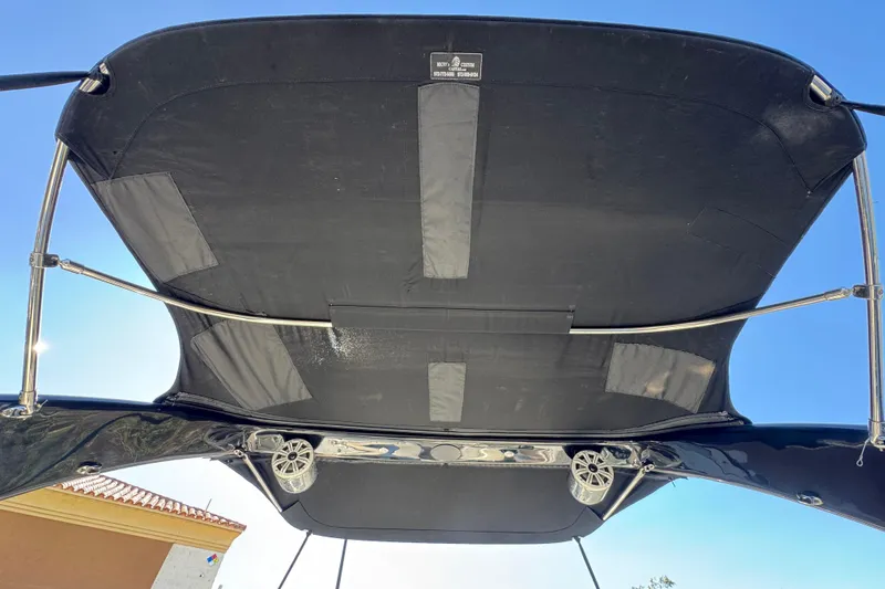 Slide: The Image of 2010 Regal 2300 RX Bowrider bimini top with speakers, viewed from below. - 19