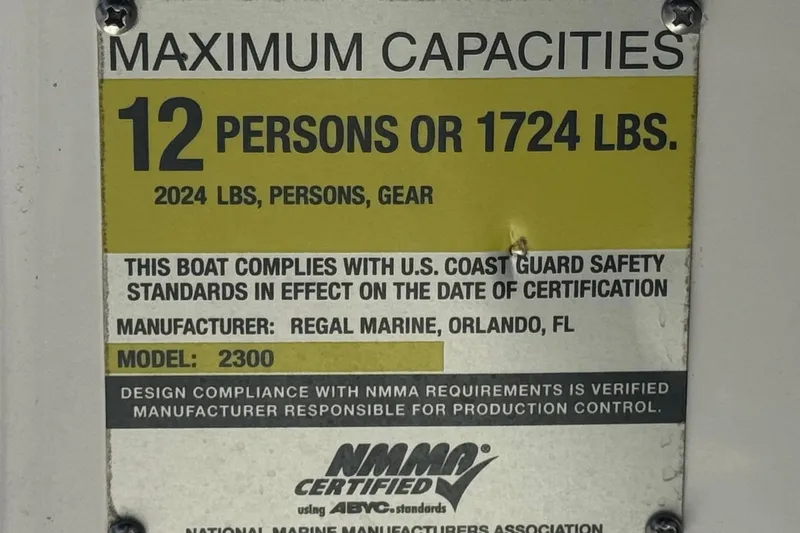 Slide: The Image of 2010 Regal 2300 RX Bowrider capacity plate, 12 persons or 1724 lbs, NMMA certified. - 37