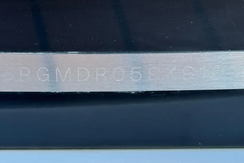 Slide: The Image of Hull identification number on 2010 Regal 2300 RX Bowrider boat. - 38