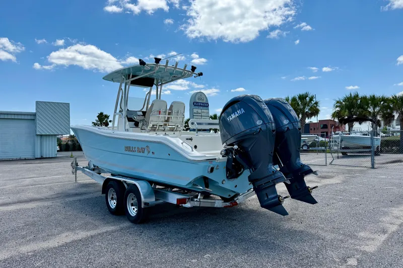 Slide: The Image of 2026 Bulls Bay 255 Center Console boat with dual Yamaha engines on trailer. - 7