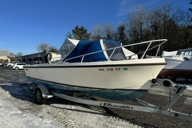 Slide: The Image of 1991 Mako 191 Inshore boat on trailer in outdoor setting. - 2