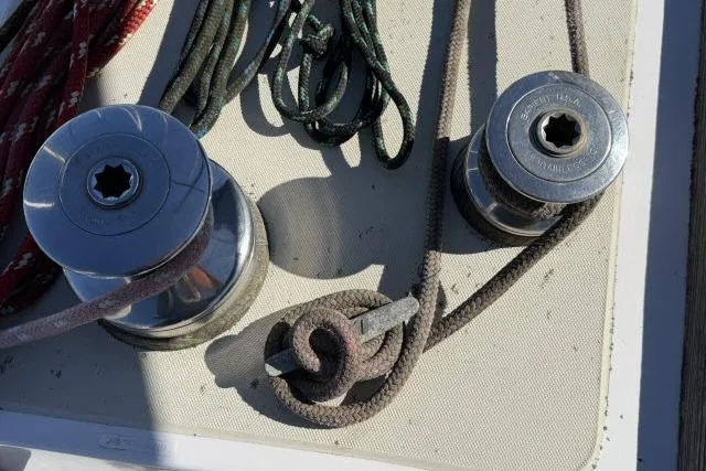 Slide: The Image of Sailing winches and ropes on a 1976 CAL 3-30 boat deck. - 11