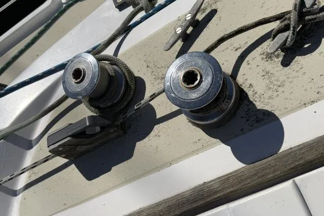 Slide: The Image of Winches and ropes on a 1976 CAL 3-30 sailboat deck. - 12