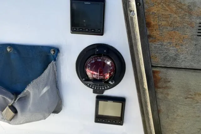 Slide: The Image of Boat dashboard with compass and instruments, CAL 3-30, 1976 model. - 8