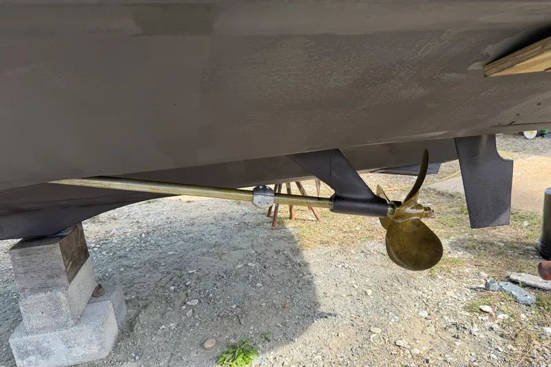 Slide: The Image of Propeller and shaft of a 1994 Tiara Yachts 3100 Open on dry dock. - 10