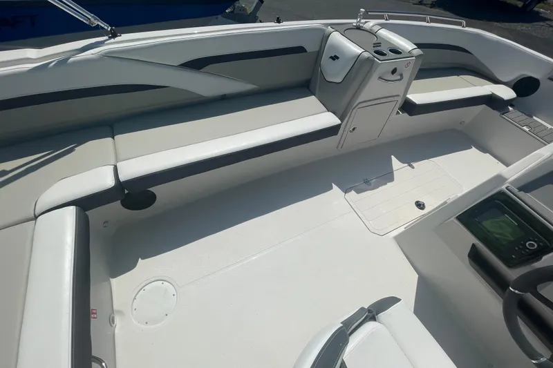 Slide: The Image of 2026 Starcraft SVX 211 OB boat interior with spacious seating and modern design. - 7