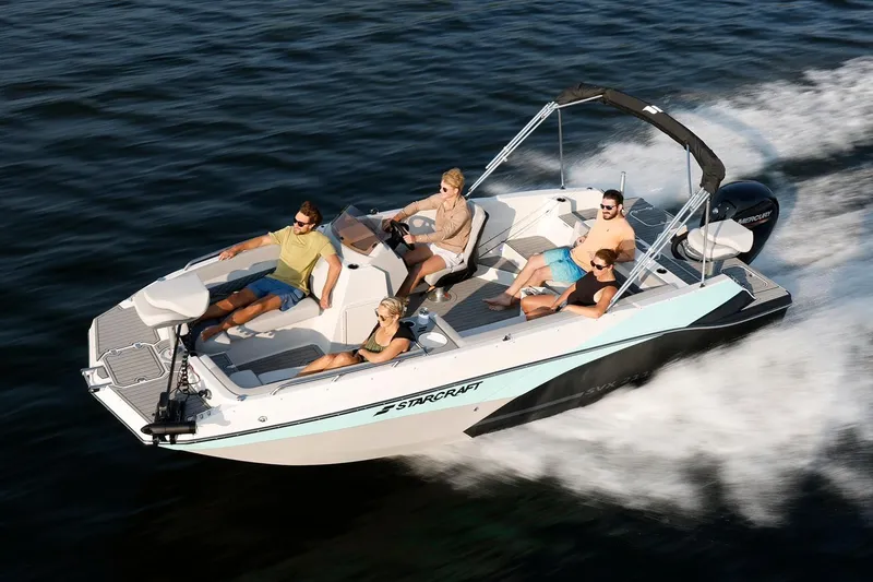 Slide: The Image of Manufacturer Provided Image: 2026 Starcraft SVX 211 OB boat cruising with four passengers on open water. - 8
