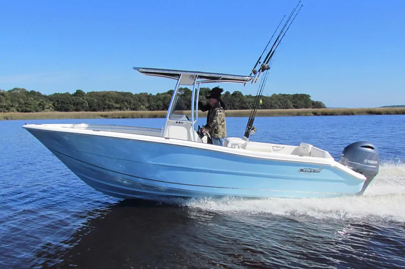 The Image of Manufacturer Provided Image: 2025 Bulls Bay 230 Center Console boat cruising on a calm lake. - 0