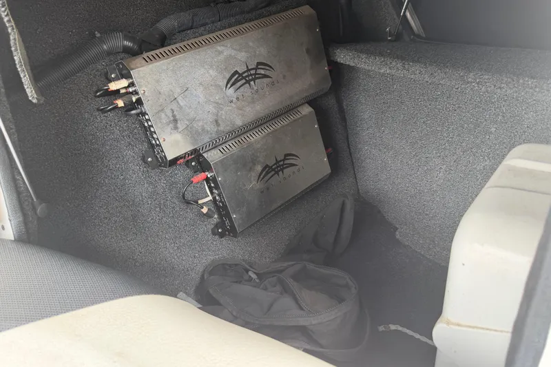 Slide: The Image of Audio amplifiers installed in a 2010 Tigé RZ2 boat interior. - 24