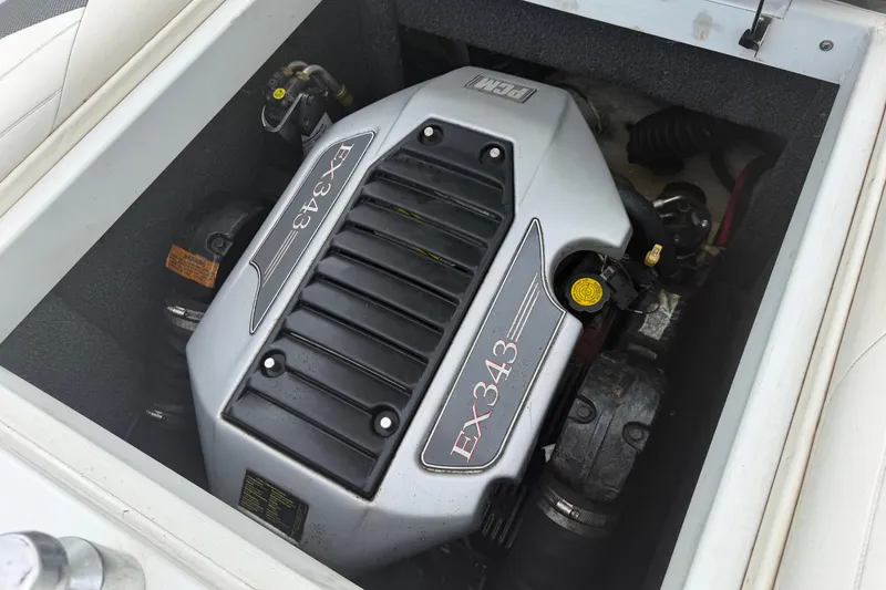 Slide: The Image of 2010 Tigé RZ2 boat engine compartment featuring PCM EX343 engine. - 8
