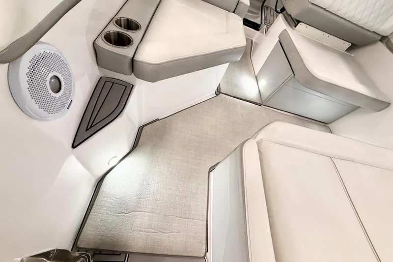 Slide: The Image of Interior of 2021 Regal 26 Express boat with seating and speaker system. - 13