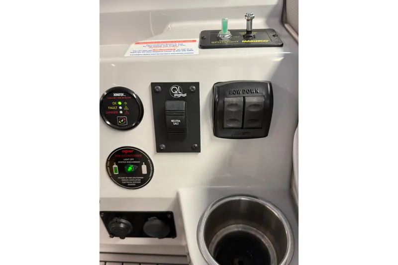 Slide: The Image of Control panel of 2021 Regal 26 Express boat with various switches and indicators. - 14