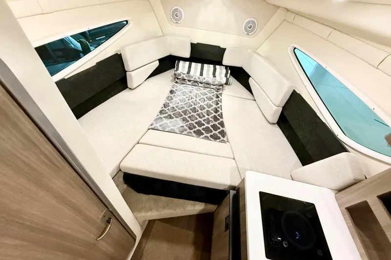 Slide: The Image of 2021 Regal 26 Express cabin interior with cozy seating and modern design. - 17