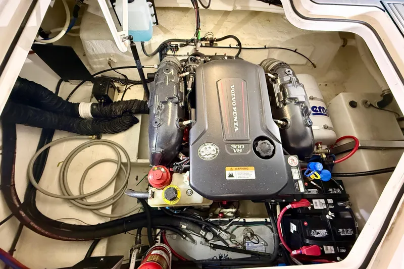 Slide: The Image of Engine compartment of a 2021 Regal 26 Express boat with Volvo Penta 300 V8 engine. - 39