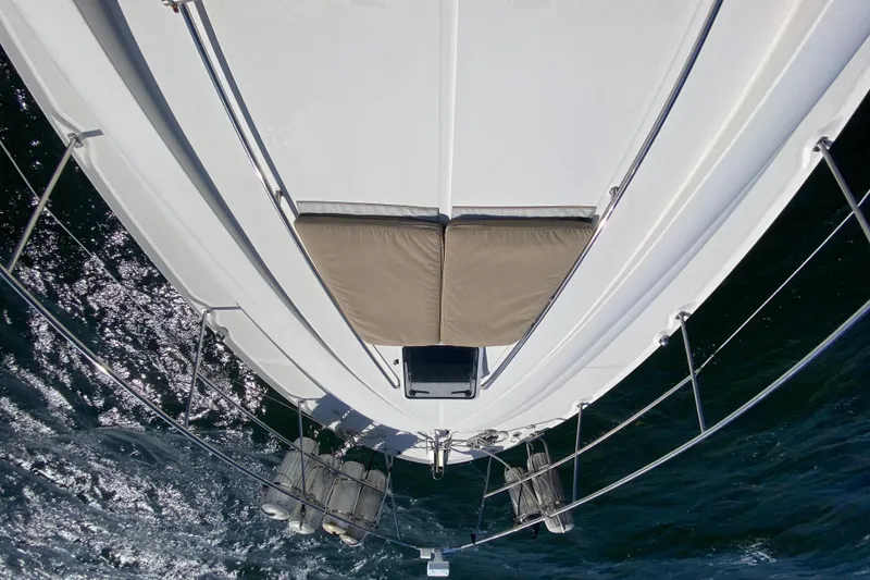 Slide: The Image of Top view of 2003 Sea Ray 480 Motor Yacht on water, showcasing deck and railings. - 26