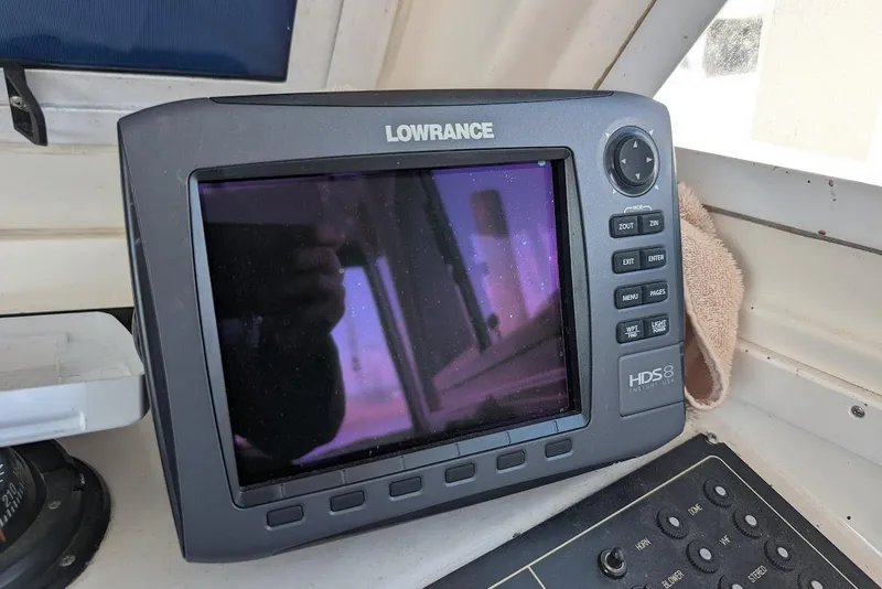 Slide: The Image of Lowrance HDS8 marine GPS system on 1998 Cherokee 270 Sportsman boat dashboard. - 33