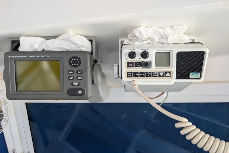 Slide: The Image of Furuno GPS navigator and radio equipment on a 1998 Cherokee 270 Sportsman boat. - 38