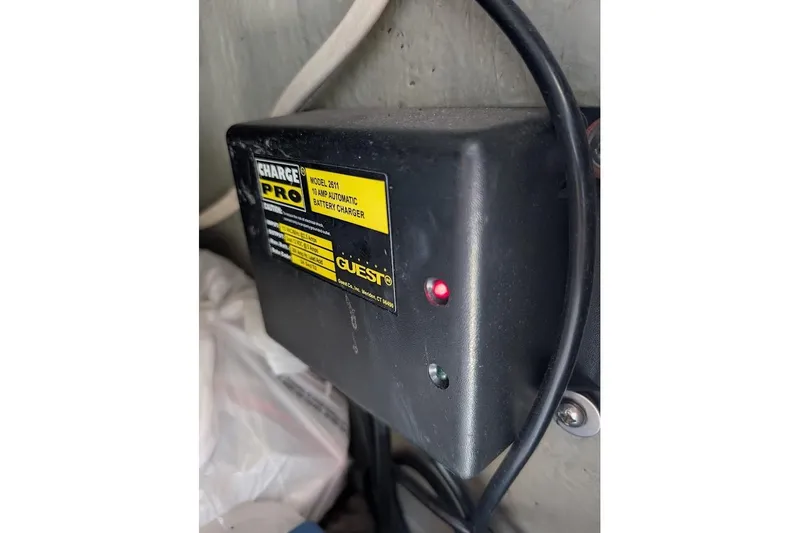 Slide: The Image of Automatic battery charger in a 1998 Cherokee 270 Sportsman boat. - 45