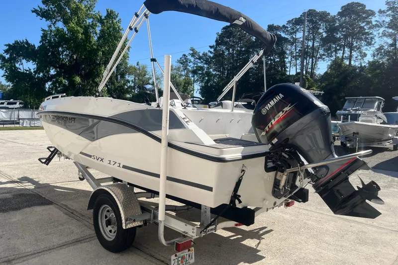 Slide: The Image of 2025 Starcraft SVX 171 OB boat with Yamaha outboard motor on trailer. - 21
